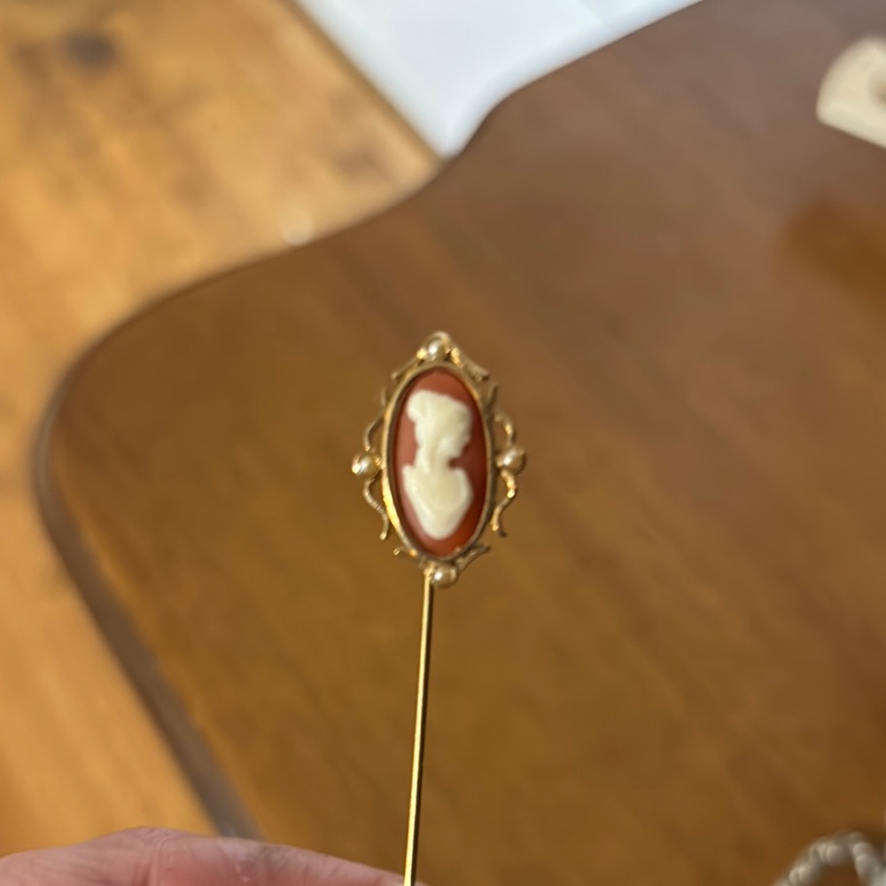 Avon Gold and White Brooch with Filigree Design